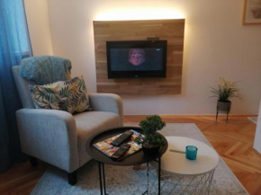 Small (34m2) modern apartment with parking place